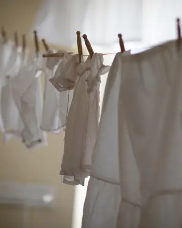 A bunch of white clothes hanging